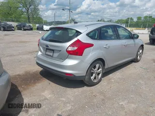 2014 Ford Focus SE with VIN 1FADP3K22EL140219, listed as a IAAI auction lot 42107380 with 205,519 mi miles. Bid and sale history available at carsss.com. Image 4.