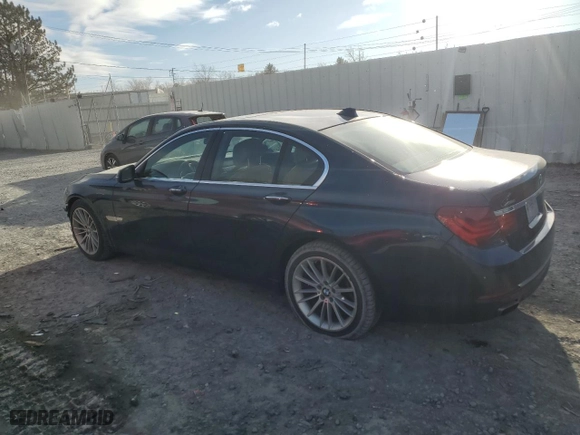 2013 BMW 7 Series 750i xDrive with VIN WBAYB6C50DD223786, listed as a Copart auction lot 87579345 with 143,523 mi miles and Salvage Title. Bid and sale history available at carsss.com. Image 2.
