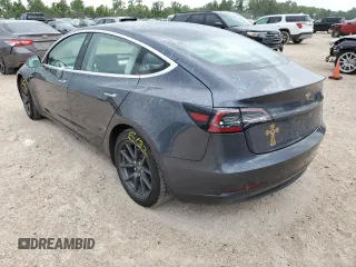 2018 Tesla Model 3 Long Range Battery z VIN 5YJ3E1EB2JF169809, wystawiony jako Copart lot #60623104 z przebiegiem 81 747 mil mil oraz Tytuł czysty. Historia ofert i sprzedaży dostępna na DreamBid. Obrazek 2.