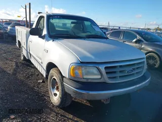 2002 Ford F-150 XL with VIN 1FTRF17242NB49973, listed as a IAAI auction lot 40825610 with 1 mi miles. Bid and sale history available at carsss.com. Image 1.