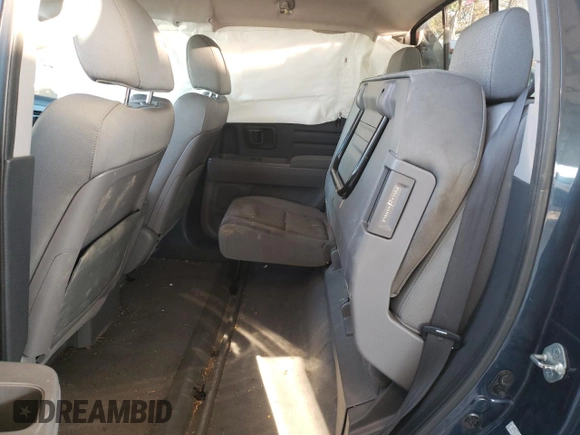 2012 Honda Ridgeline RT with VIN 5FPYK1F21CB458655, listed as a Copart auction lot 73167424 with 134,725 mi miles and Salvage title. Bid and sale history available at DreamBid. Image 11.