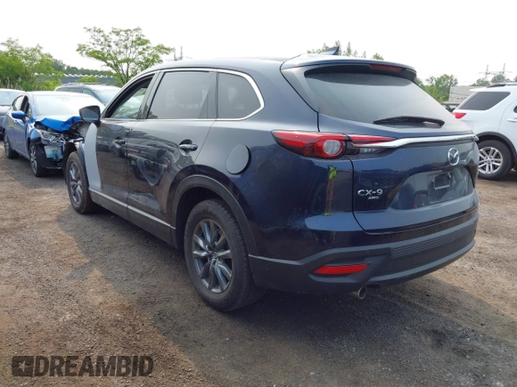 2023 Mazda CX-9 Touring with VIN JM3TCBCY6P0642838, listed as a IAAI auction lot 42407123 with 15,181 mi miles and . Bid and sale history available at DreamBid. Image 3.
