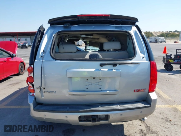 2010 GMC Yukon SLT with VIN 1GKUCCE01AR272822, listed as a IAAI auction lot 40572095 with 268,019 mi miles. Bid and sale history available at carsss.com. Image 16.