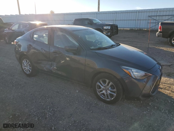 2017 Toyota Yaris iA with VIN 3MYDLBYV4HY153133, listed as a Copart auction lot 79131944 with 132,514 mi miles and Salvage Title. Bid and sale history available at carsss.com. Image 4.