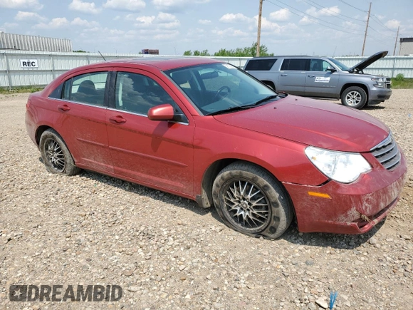 2010 Chrysler Sebring Limited with VIN 1C3CC5FD1AN197099, listed as a Copart auction lot 59128825 with 85,736 mi miles and Salvage title. Bid and sale history available at DreamBid. Image 4.