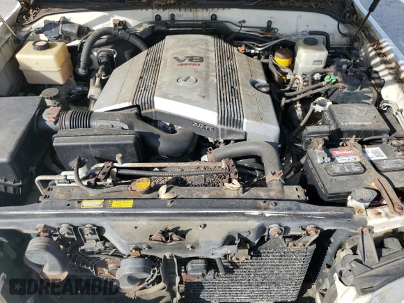 2002 Lexus LX 470 z VIN JTJHT00W623517039, wystawiony jako Copart lot #51458785 z przebiegiem 219 906 mil mil oraz Tytuł czysty. Historia ofert i sprzedaży dostępna na DreamBid. Obrazek 12.