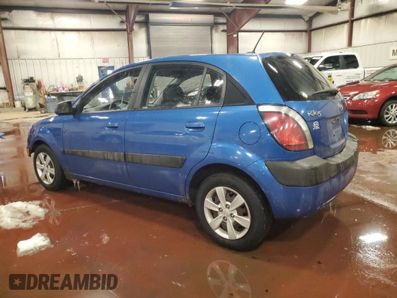 2009 Kia Rio LX with VIN KNADE243196505992, listed as a Copart auction lot 46054315 with 118,647 mi miles and Clean Title. Bid and sale history available at carsss.com. Image 2.