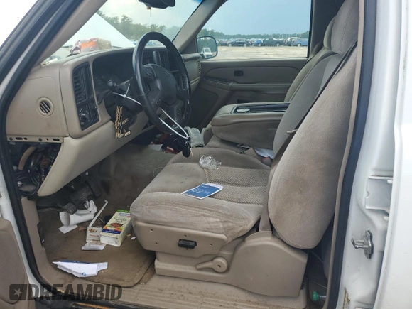 2005 Chevrolet Tahoe LS with VIN 1GNEC13V25R187388, listed as a Copart auction lot 61913465 with 198,657 mi miles and Salvage title. Bid and sale history available at DreamBid. Image 7.