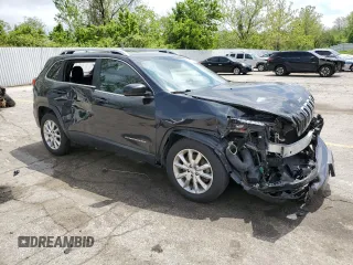 2016 Jeep Cherokee Limited with VIN 1C4PJMDS9GW267854, listed as a Copart auction lot 55031185 with 151,444 mi miles and Salvage title. Bid and sale history available at DreamBid. Image 4.