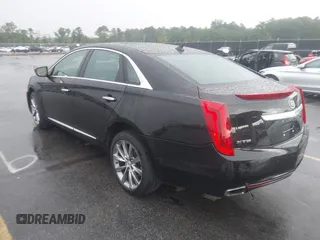2013 Cadillac XTS Premium z VIN 2G61S5S39D9112491, wystawiony jako IAAI lot #42216373 z przebiegiem 145 338 mil mil oraz . Historia ofert i sprzedaży dostępna na DreamBid. Obrazek 3.