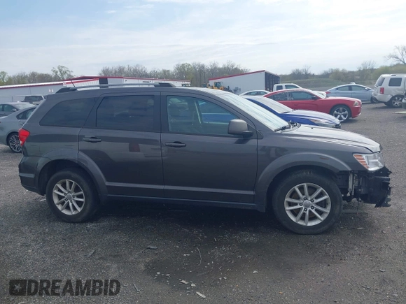 2017 Dodge Journey SXT with VIN 3C4PDDBG5HT618563, listed as a IAAI auction lot 42015188 with 104,747 mi miles and . Bid and sale history available at DreamBid. Image 13.