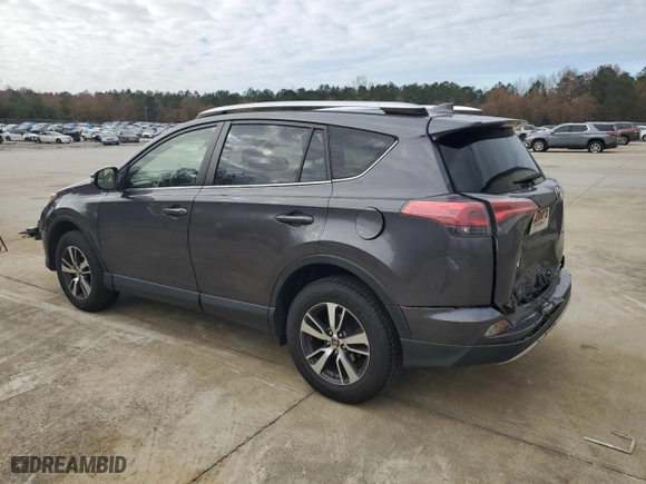 2016 Toyota RAV4 XLE with VIN JTMRFREV0GJ060556, listed as a Copart auction lot 84883774 with 85,486 mi miles and Salvage Title. Bid and sale history available at carsss.com. Image 2.
