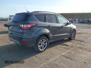 2017 Ford Escape SE with VIN 1FMCU0GD1HUE75697, listed as a IAAI auction lot 42077385 with 160,634 mi miles and . Bid and sale history available at DreamBid. Image 4.
