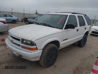 2004 Chevrolet Blazer LS z VIN 1GNDT13X34K157711, wystawiony jako IAAI lot #41282289 z przebiegiem 148 013 mil mil oraz . Historia ofert i sprzedaży dostępna na DreamBid. Obrazek 2.