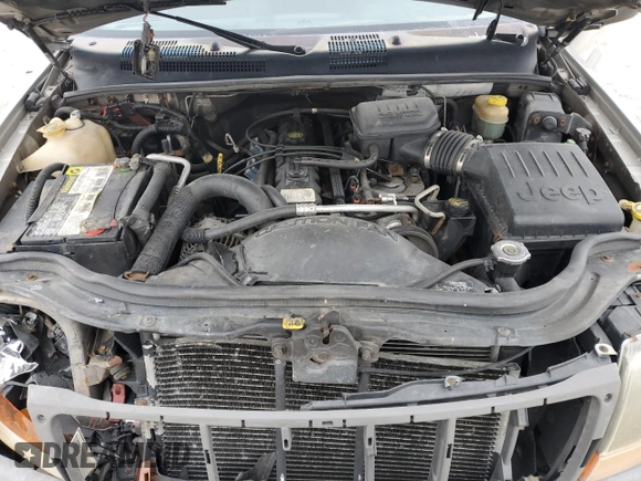 2000 Jeep Grand Cherokee Laredo z VIN 1J4GW48S8YC335926, wystawiony jako Copart lot #80693454 z przebiegiem 353 635 mil mil oraz Nie do naprawy • Non repairable. Historia ofert i sprzedaży dostępna na DreamBid. Obrazek 12.