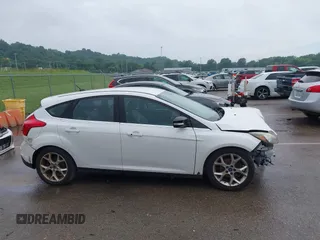 2014 Ford Focus Titanium with VIN 1FADP3N24EL184220, listed as a IAAI auction lot 42429610 with 172,575 mi miles and . Bid and sale history available at DreamBid. Image 14.