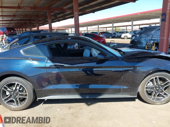 2021 Ford Mustang EcoBoost with VIN 1FA6P8TH2M5104154, listed as a IAAI auction lot 41869810 with 15,561 mi miles and . Bid and sale history available at DreamBid. Image 12.
