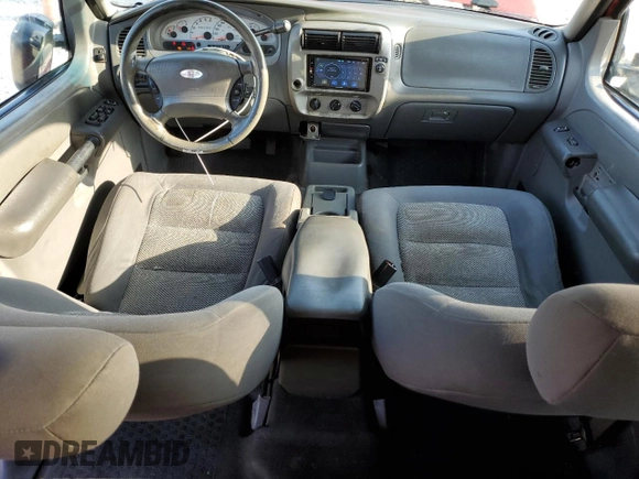 2004 Ford Explorer Sport Trac XLS z VIN 1FMZU67K24UA04776, wystawiony jako Copart lot #56180655 z przebiegiem 261 876 mil mil oraz Szkoda całkowita • Salvage title. Historia ofert i sprzedaży dostępna na DreamBid. Obrazek 8.