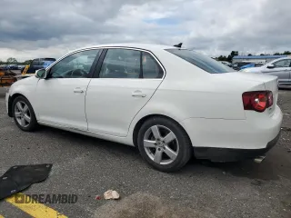 2009 Volkswagen Jetta SE z VIN 3VWRM71K39M057367, wystawiony jako Copart lot #58745235 z przebiegiem 130 647 mil mil oraz Szkoda całkowita • Salvage title. Historia ofert i sprzedaży dostępna na DreamBid. Obrazek 2.