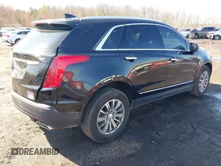 2019 Cadillac XT5 Luxury AWD with VIN 1GYKNDRS0KZ219247, listed as a IAAI auction lot 41870568 with 58,734 mi miles and . Bid and sale history available at carsss.com. Image 4.
