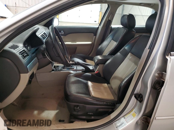 2006 Mercury Milan Premier with VIN 3MEHM08116R638785, listed as a Copart auction lot 64641395 with 127,178 mi miles and Salvage title. Bid and sale history available at DreamBid. Image 7.