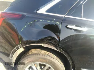 2022 Cadillac XT5 AWD Premium Luxury with VIN 1GYKNDR4XNZ164098, listed as a IAAI auction lot 41822372 with 32,644 mi miles and . Bid and sale history available at DreamBid. Image 17.