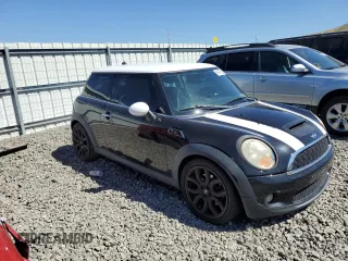 2010 MINI Hardtop S with VIN WMWMF7C57ATX43204, listed as a Copart auction lot 64771285 with 92,236 mi miles and Clean title. Bid and sale history available at DreamBid. Image 4.