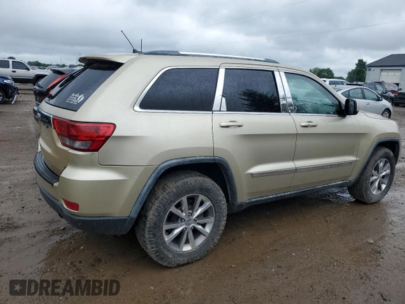 2011 Jeep Grand Cherokee Laredo z VIN 1J4RR4GG0BC562824, wystawiony jako Copart lot #61625445 z przebiegiem 166 490 mil mil oraz Czysty tytuł • Clean title. Historia ofert i sprzedaży dostępna na DreamBid. Obrazek 3.