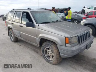1997 Jeep Grand Cherokee Laredo with VIN 1J4GZ58S4VC745129, listed as a IAAI auction lot 41641005 with 1 mi miles. Bid and sale history available at carsss.com. Image 1.