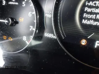 2024 Mazda 3 S with VIN 3MZBPAAM2RM427070, listed as a IAAI auction lot 41332154 with 6,689 mi miles and . Bid and sale history available at DreamBid. Image 16.
