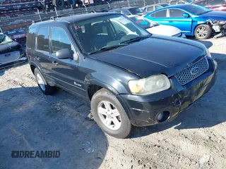 2006 Ford Escape Hybrid with VIN 1FMCU96H26KA26076, listed as a IAAI auction lot 41833227 with 236,280 mi miles and . Bid and sale history available at DreamBid. Image 1.