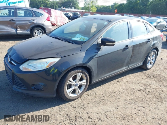 2013 Ford Focus SE with VIN 1FADP3F21DL230177, listed as a IAAI auction lot 42579815 with 243,525 mi miles and . Bid and sale history available at DreamBid. Image 2.