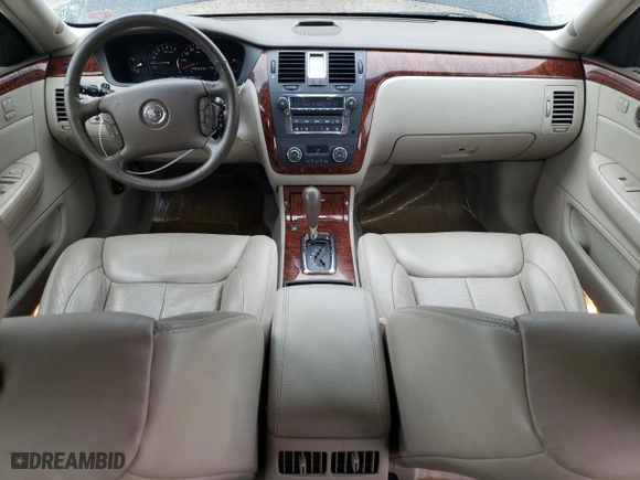 2006 Cadillac DTS w/1SC with VIN 1G6KD57Y66U165982, listed as a Copart auction lot 72035154 with 106,201 mi miles and Salvage Title. Bid and sale history available at carsss.com. Image 8.