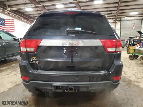 2011 Jeep Grand Cherokee Laredo with VIN 1J4RR4GT6BC509574, listed as a Copart auction lot 84859974 with 127,718 mi miles and Clean Title. Bid and sale history available at carsss.com. Image 6.