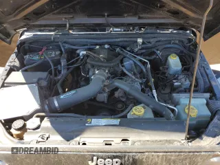 2007 Jeep Wrangler Sahara z VIN 1J4FA54177L183617, wystawiony jako Copart lot #49660785 z przebiegiem 178 846 mil mil oraz Szkoda całkowita • Salvage title. Historia ofert i sprzedaży dostępna na DreamBid. Obrazek 11.