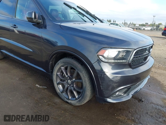 2015 Dodge Durango R/T with VIN 1C4SDJCT1FC188401, listed as a IAAI auction lot 42124652 with 86,339 mi miles and . Bid and sale history available at carsss.com. Image 6.