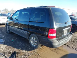 2004 Kia Sedona LX with VIN KNDUP131X46601278, listed as a IAAI auction lot 41472321 with 202,212 mi miles. Bid and sale history available at carsss.com. Image 3.