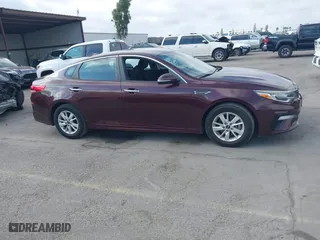 2019 Kia Optima LX with VIN 5XXGT4L36KG284965, listed as a IAAI auction lot 40374239 with 64,351 mi miles. Bid and sale history available at carsss.com. Image 13.