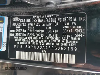 2013 Kia Sorento EX with VIN 5XYKU3A66DG363159, listed as a Copart auction lot 50256185 with 98,934 mi miles and Clean Title. Bid and sale history available at DreamBid. Image 13.