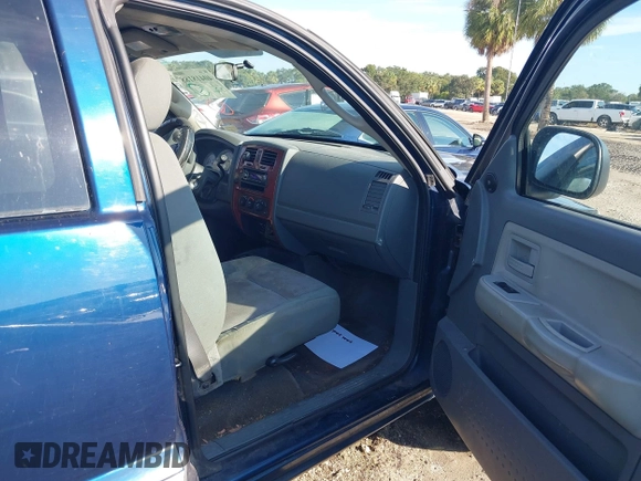2005 Dodge Dakota SLT with VIN 1D7HW42N05S365877, listed as a IAAI auction lot 40418188 with 280,423 mi miles and . Bid and sale history available at DreamBid. Image 5.