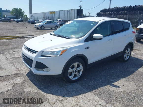 2014 Ford Escape SE with VIN 1FMCU9GX9EUC61521, listed as a IAAI auction lot 42535244 with 129,315 mi miles and . Bid and sale history available at DreamBid. Image 2.