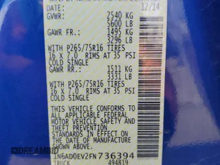 2015 Nissan Frontier Pro-4X with VIN 1N6AD0EV2FN736394, listed as a Copart auction lot 53916455 with 116,801 mi miles and Salvage title. Bid and sale history available at DreamBid. Image 12.