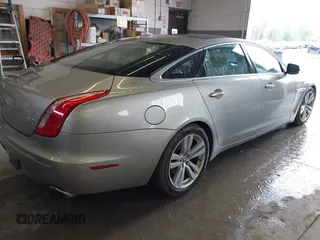 2013 Jaguar XJ Portfolio with VIN SAJWJ2GD0D8V50948, listed as a IAAI auction lot 42067884 with 110,053 mi miles and . Bid and sale history available at DreamBid. Image 4.