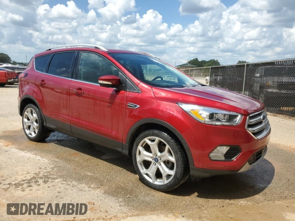 2019 Ford Escape Titanium z VIN 1FMCU0J97KUB20612, wystawiony jako Copart lot #64638415 z przebiegiem 100 102 mil mil oraz Czysty tytuł • Clean title. Historia ofert i sprzedaży dostępna na DreamBid. Obrazek 4.