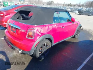 2009 MINI Convertible with VIN WMWMR33569TU95961, listed as a IAAI auction lot 41689845 with 107,934 mi miles and . Bid and sale history available at DreamBid. Image 4.
