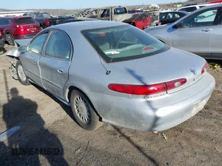 1996 Mercury Sable GS with VIN 1MELM50U5TA633365, listed as a IAAI auction lot 41723519 with 144,067 mi miles. Bid and sale history available at carsss.com. Image 3.