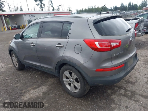 2012 Kia Sportage LX with VIN KNDPB3A22C7262656, listed as a IAAI auction lot 42301331 with 180,743 mi miles and . Bid and sale history available at DreamBid. Image 3.
