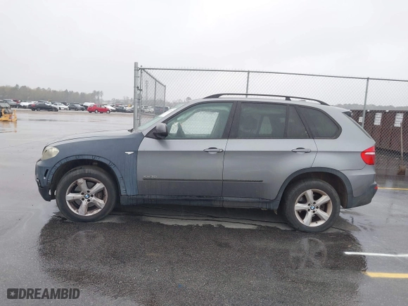 2009 BMW X5 30i with VIN 5UXFE43579L271366, listed as a IAAI auction lot 41831724 with 129,107 mi miles. Bid and sale history available at carsss.com. Image 14.