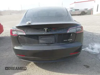 2022 Tesla Model 3 Long Range with VIN 5YJ3E1EB6NF343869, listed as a IAAI auction lot 41826077 with 36,643 mi miles and . Bid and sale history available at DreamBid. Image 15.