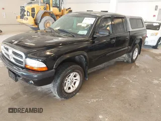 2004 Dodge Dakota Sport with VIN 1D7HG38N24S501391, listed as a IAAI auction lot 41736751 with 213,299 mi miles and . Bid and sale history available at carsss.com. Image 2.